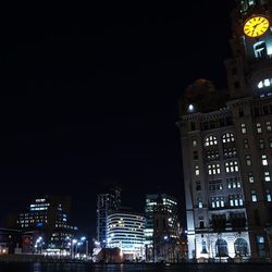 Illuminated cityscape at night