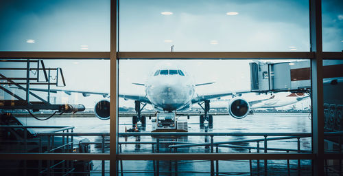 Close-up of airplane against sky