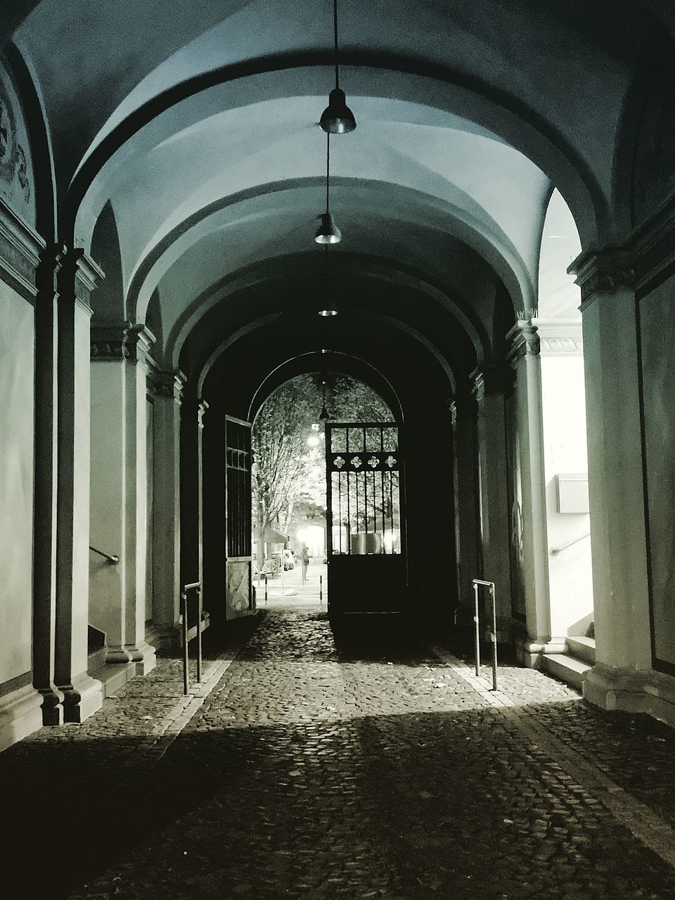 arch, architecture, built structure, building, the way forward, direction, indoors, no people, arcade, architectural column, corridor, day, empty, entrance, flooring, door, lighting equipment, absence, ceiling, arched