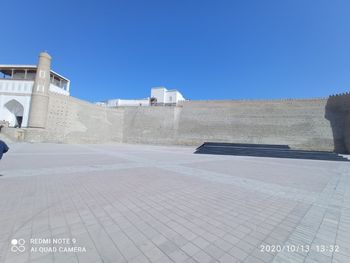 View of building against clear blue sky