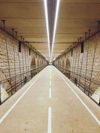 Empty illuminated underground walkway