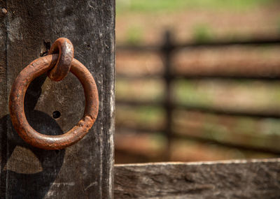 Close-up of rusty metal doorknocker