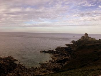 View of sea against cloudy sky