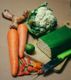 High angle view of vegetables on cutting board