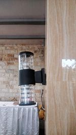 Close-up of electric lamp on wall