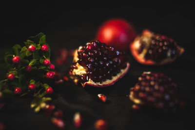 Close-up of berries over black background