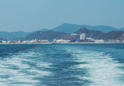 Scenic view of sea against clear blue sky