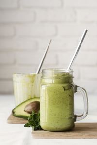 Close-up of drink in glass jar on table