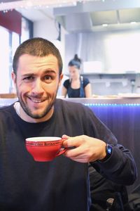 Portrait of man having coffee in cafe