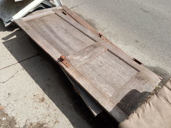 High angle view of shadow on bench