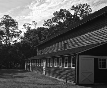 View of house with trees in background