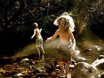 Boy playing in water