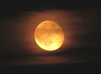 Low angle view of moon against sky at night