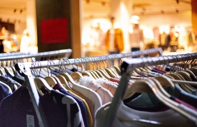 Clothes displayed on rack in store