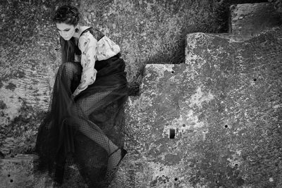 Full length of couple kissing on the road