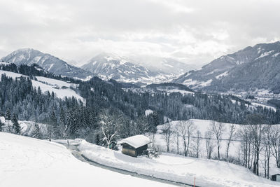 Scenic view of snowcapped mountains against sky