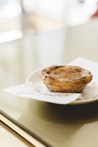 Close-up of portuguese cake in plate on table