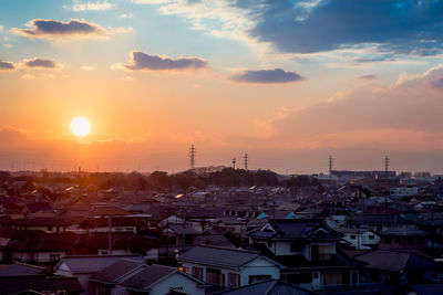 High angle view of townscape against sky during sunset