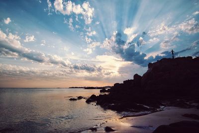 Scenic view of sea at sunset