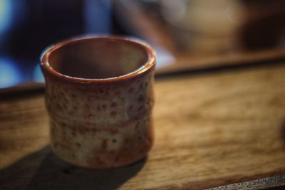 Close-up of coffee cup on table