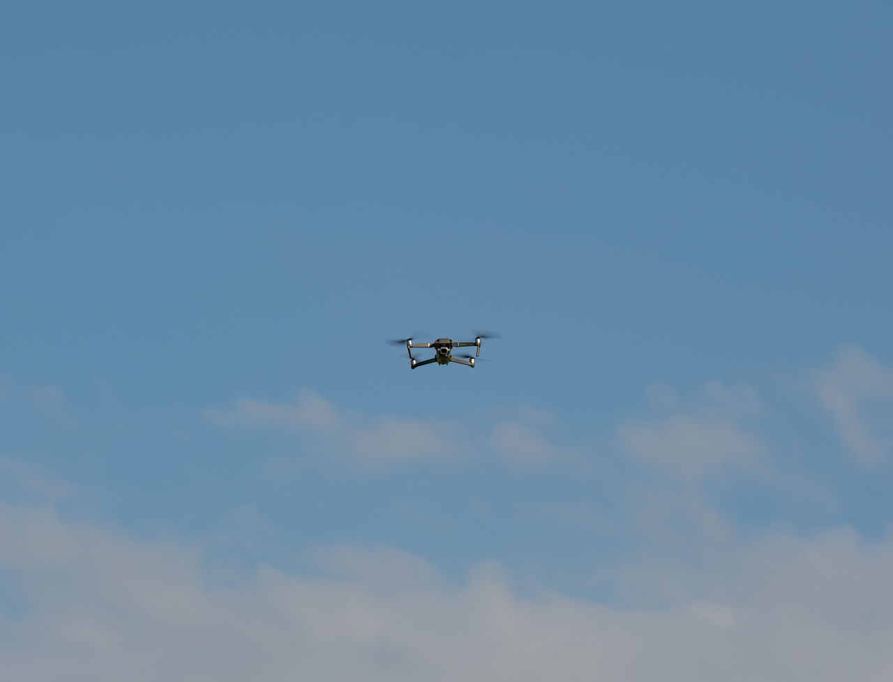 LOW ANGLE VIEW OF AIRPLANE AGAINST SKY