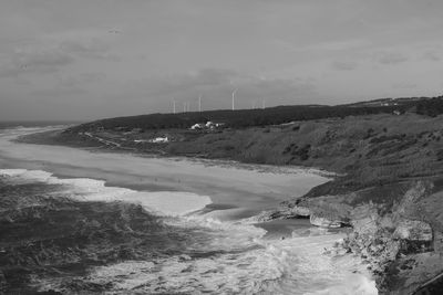 Scenic view of beach against sky