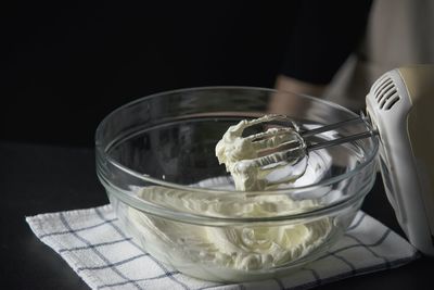 High angle view of ice cream in glass bowl on table