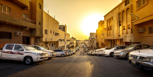 Sun shining through car on street
