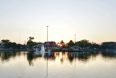 Scenic view of lake against sky during sunset