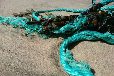 Detail shot of ropes on sand