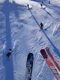 High angle view of people skiing on snow