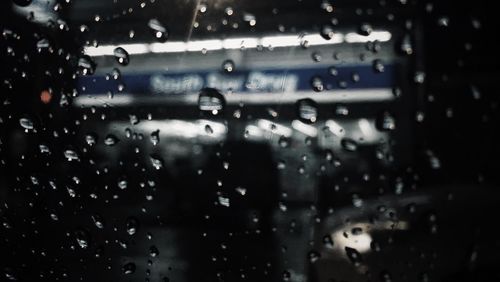 Close-up of water drops on glass window