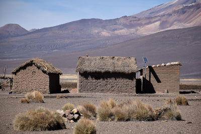 Buildings on altiplano desert area near sajama