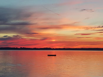 Scenic view of sea against dramatic sky
