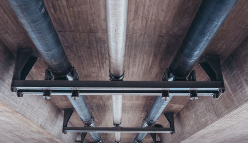 Low angle view of pipes on celing