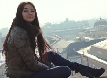 Portrait of woman standing in park