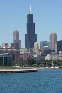 Buildings in city against sky