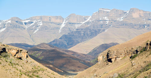 Panoramic view of landscape and mountains against clear sky