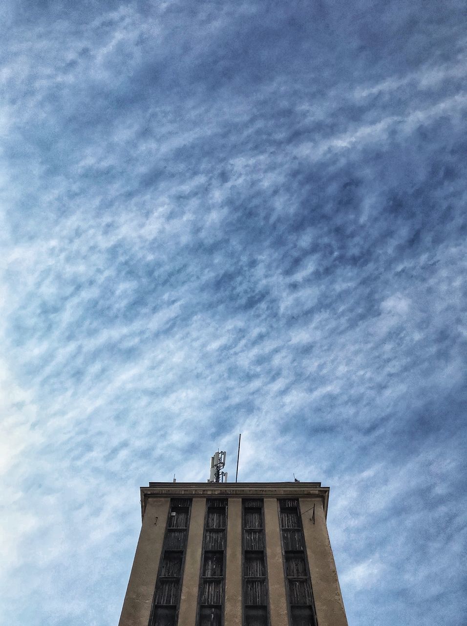 HIGH SECTION OF HISTORIC BUILDING AGAINST SKY