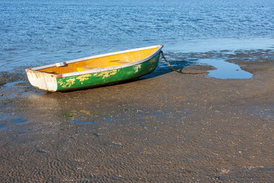 High angle view of boat moored on beach