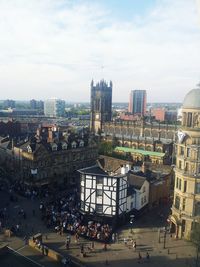 Manchester cathedral at exchange square against sky