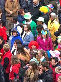 High angle view of people standing on street