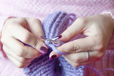 Close-up of woman holding hands