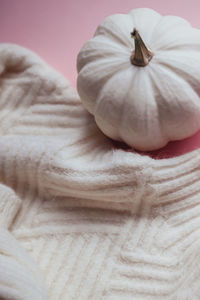 High angle view of child on pink fabric