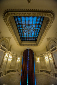 Low angle view of illuminated ceiling of building