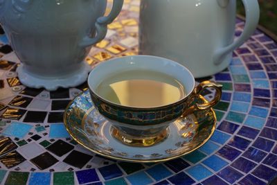 Close-up of tea cup on table