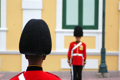 British royal guards standing against building