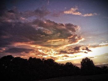 Scenic view of landscape against cloudy sky