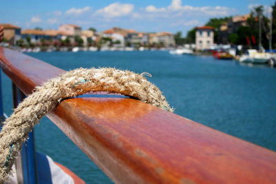 Close-up of sailboat in sea