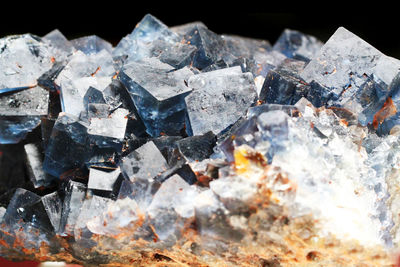 Close-up of rocks against black background